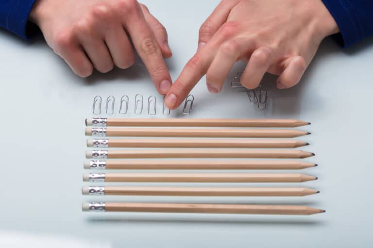 OCD behavior arranging pencils on a table.